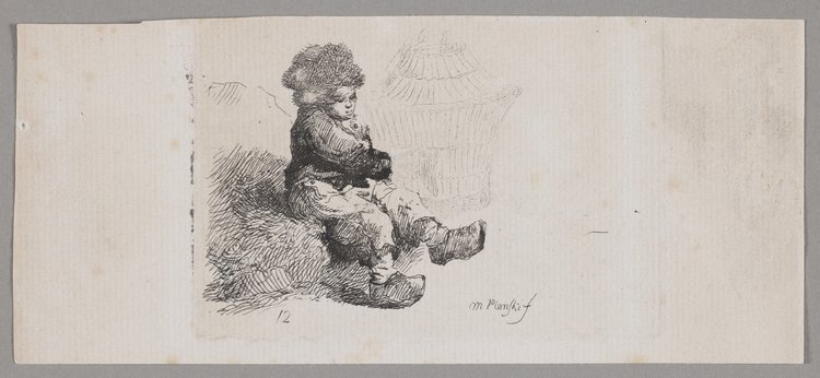 Dziecko z klatką na ptaki