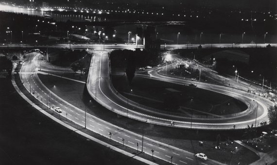 Fragment of Poniatowski Bridge and transport hub at night