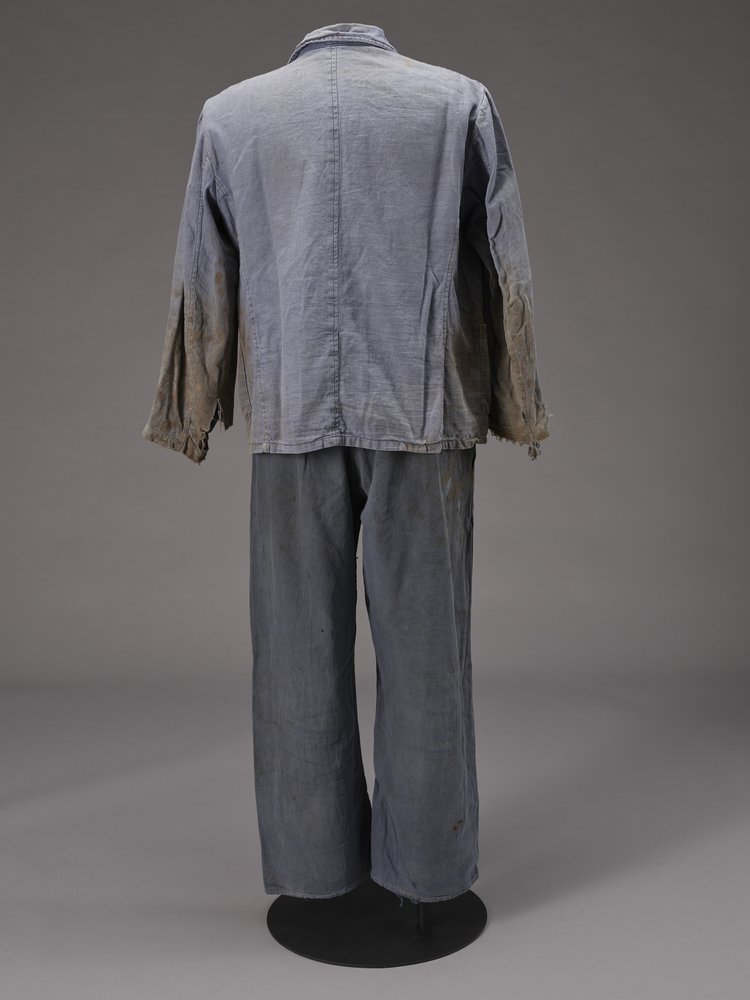 Kurtka i spodnie murarskie - ubiór robotnika z przedsiębiorstwa budowlanego Jana Kierzkowskiego