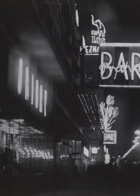 Aleje Jerozolimskie illuminated by neon signs