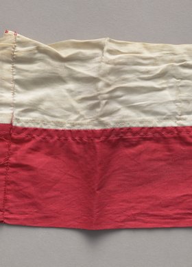 Opaska strajkowa z pieczątką NSZZ Solidarność