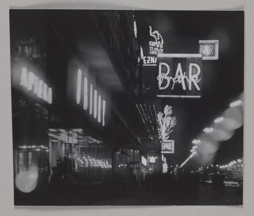 Aleje Jerozolimskie illuminated by neon signs