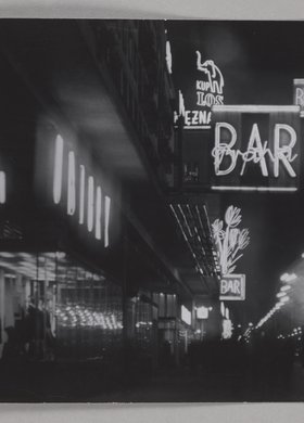 Aleje Jerozolimskie illuminated by neon signs